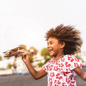 girl-flying-wooden-plane-px.jpg girl-flying-wooden-plane-px.jpg - River City Wellness