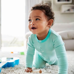 happy-baby-playing-at-home-sq-px.jpg - River City Wellness