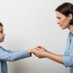 Austin mother supporting child discussing autism research brain changes with River City Wellness pediatric care