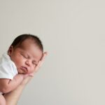 Austin baby finding comfort from effective colic remedies in parent's arms showing peaceful relief after treatment