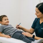 Child showing signs of nervous system dysregulation in kids during pediatric chiropractic examination in Austin