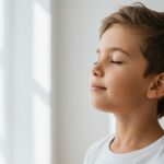 Child practicing breathing exercises showing vagus nerve and child behavior connection for nervous system health
