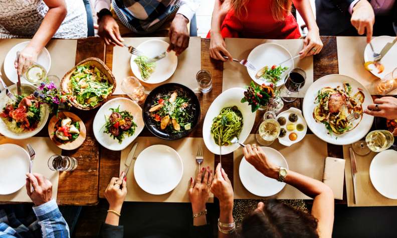 A colorful table of whole-food meal options